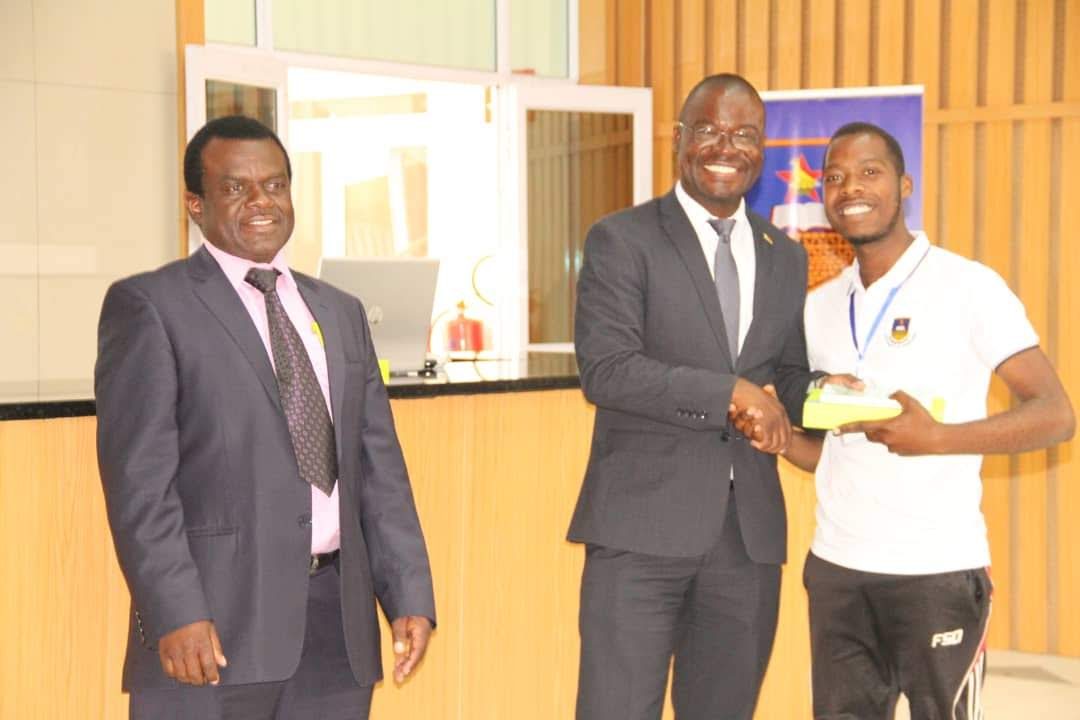 Prosper receiving an award at a ceremony